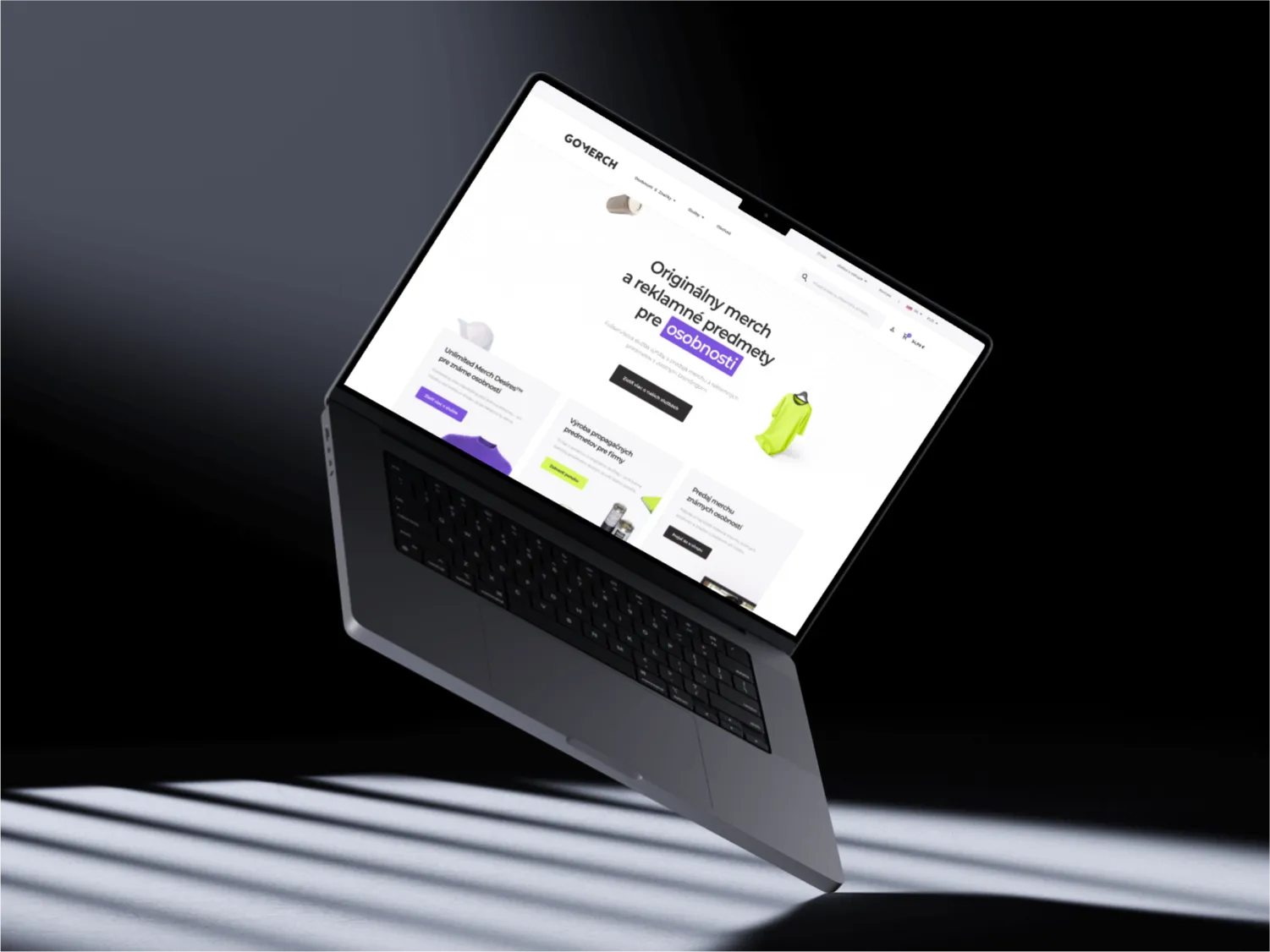 A client - GoMerch - mockup of a laptop levitating showcasing their improved rebranded landing page.